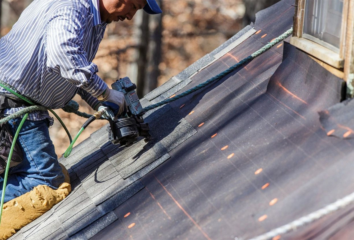 Nailing shingles with a pneumatic nail gun